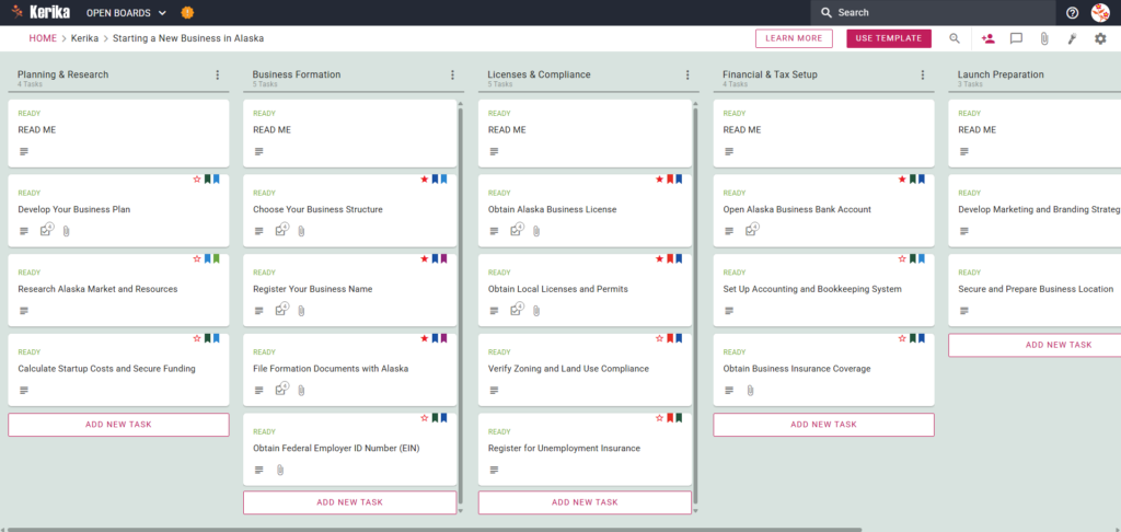Screenshot of the Kerika's kanban board displaying a project board titled "Starting a New Business in Alaska." The board features a left-to-right workflow with columns for Planning & Research, Business Formation, Licenses & Compliance, Financial & Tax Setup, and Launch Preparation, containing specific task cards like "Develop Your Business Plan" and "Obtain Alaska Business License."